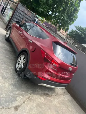 Hyundai Santa Fe Limited 4dr SUV AWD (3.3L 6cyl 6A) 2014 Red