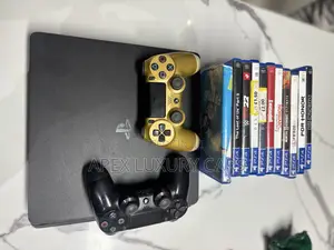 Play Station 4 Slim, With 11 Games.