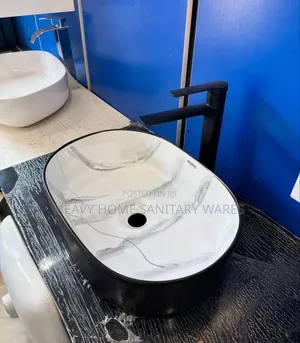 Oval Black and White Countertop Basin
