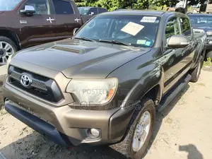 Toyota Tacoma 4dr Access Cab 4WD 6.1 ft. SB (2.7L 4cyl 4A) 2014 Gray
