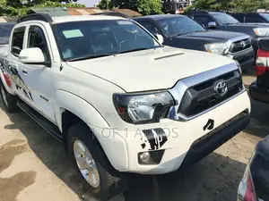 Toyota Tacoma 4dr Access Cab 6.1 ft. SB (2.7L 4cyl 5M) 2015 White