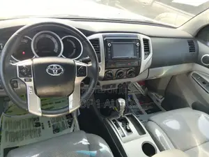Toyota Tacoma 4dr Access Cab 6.1 ft. SB (2.7L 4cyl 5M) 2015 White