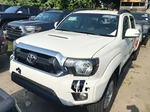Toyota Tacoma 4dr Access Cab 6.1 ft. SB (2.7L 4cyl 5M) 2015 White