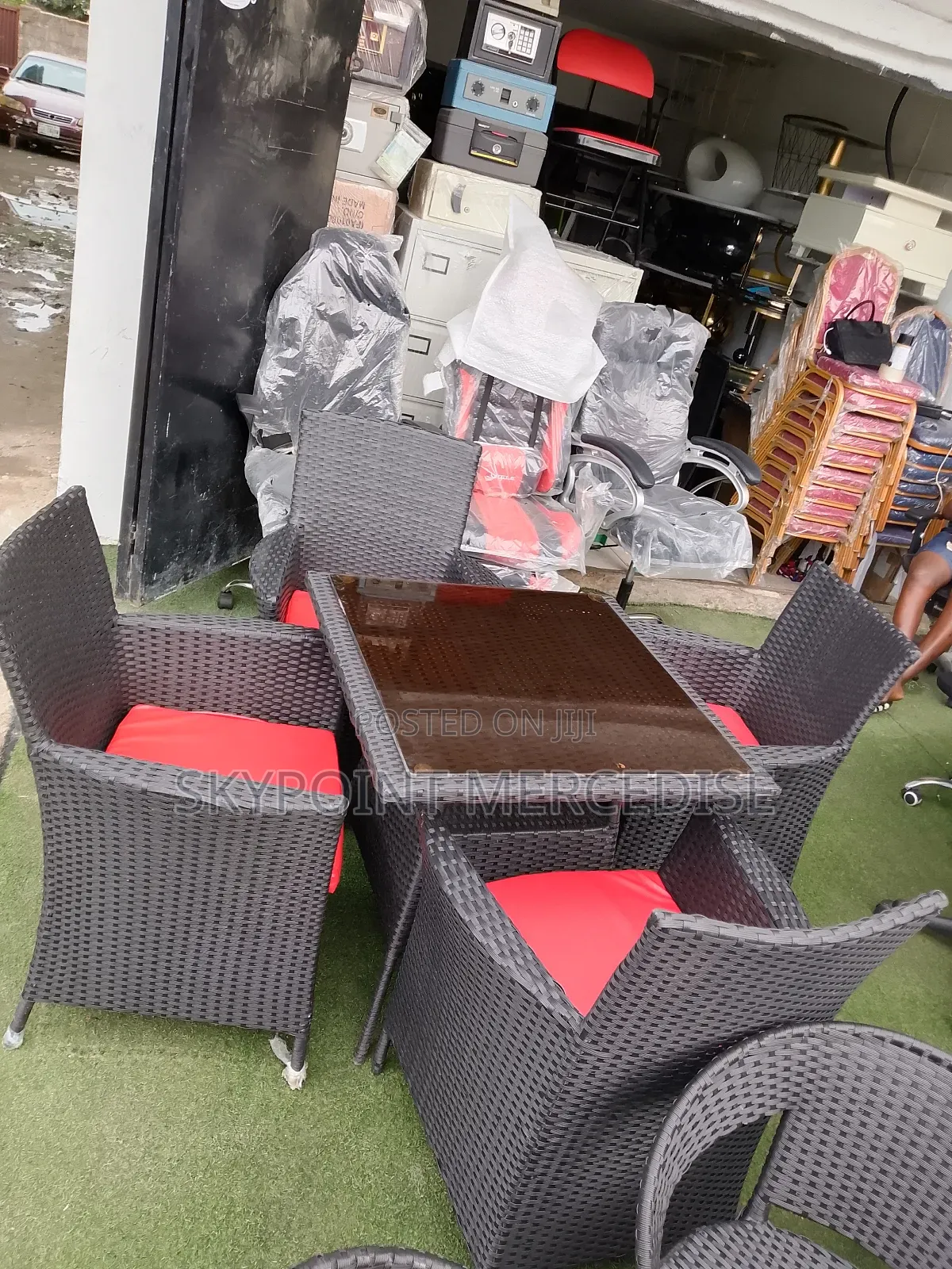 A Set of Ratian Table and Chairs