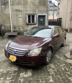 Toyota Avalon XLS Sedan FWD (3.5L 6cyl 6A) 2009 Red