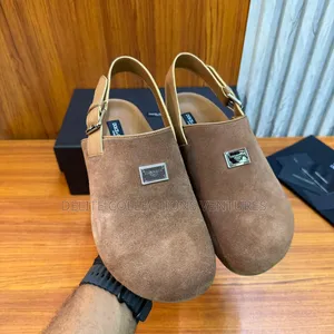 Luxury Update  
Dolce Gabbana Calfskin Leather Mule.
