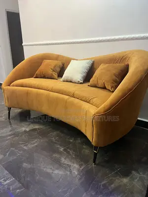 Curvy Orange Sofa for Ante Room