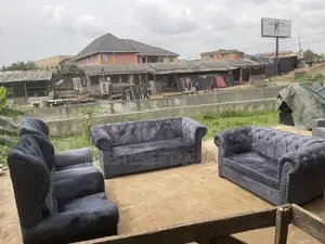 A Standard Sofa With Royal Chairs