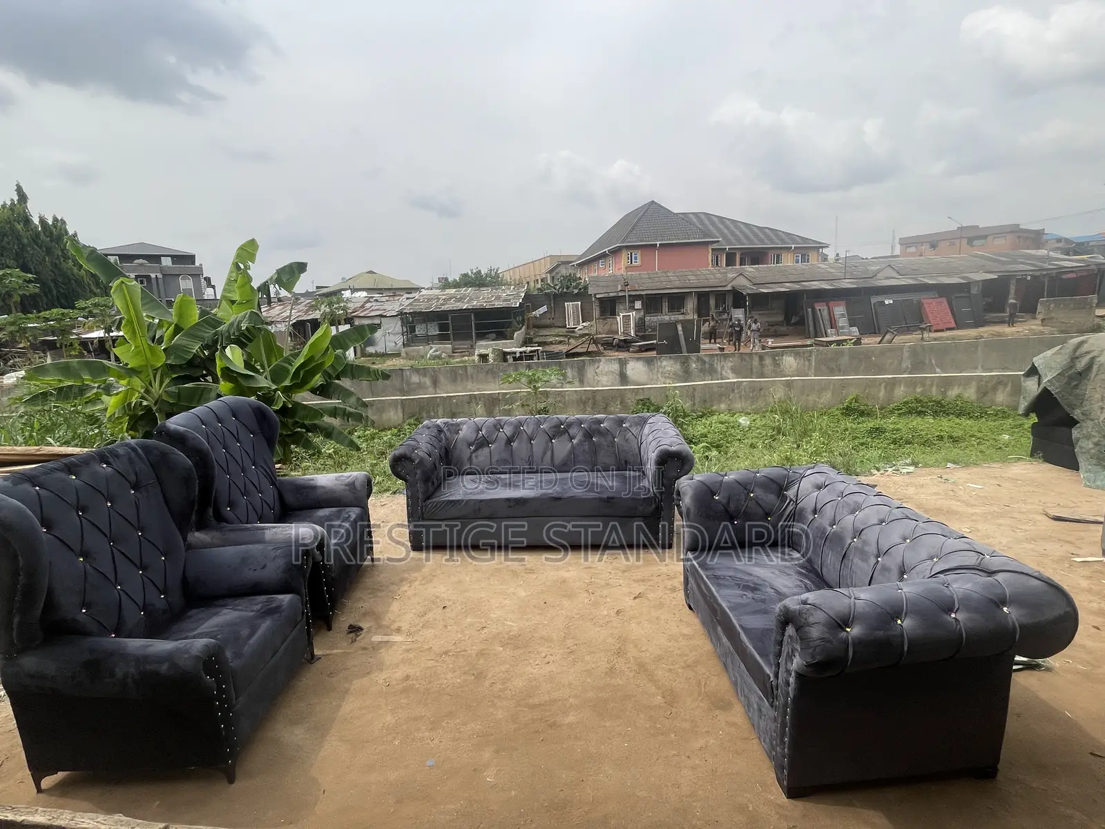 A Standard Sofa With Royal Chairs