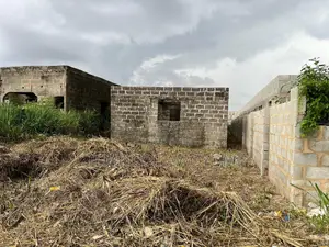 Land With Building for Sale
