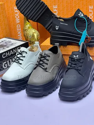 Naked Wolfe White/Black High Sole Shoe