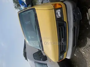 Ford E250 2002 Yellow