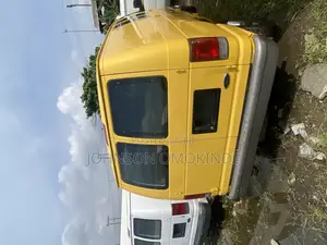 Ford E250 2002 Yellow