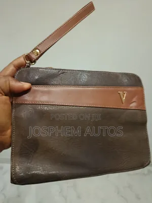 Genuine Leather Wristlet Purse Up for Grab to D Fastest Fingers First