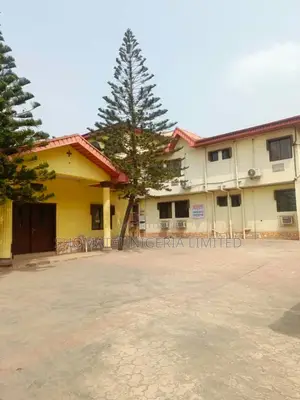 Hotel for Sale at Alakuko Lagos State on a Tiled Road