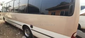 Toyota Coaster 2017 Gold