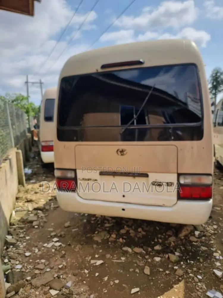 Toyota Coaster 2017 Gold