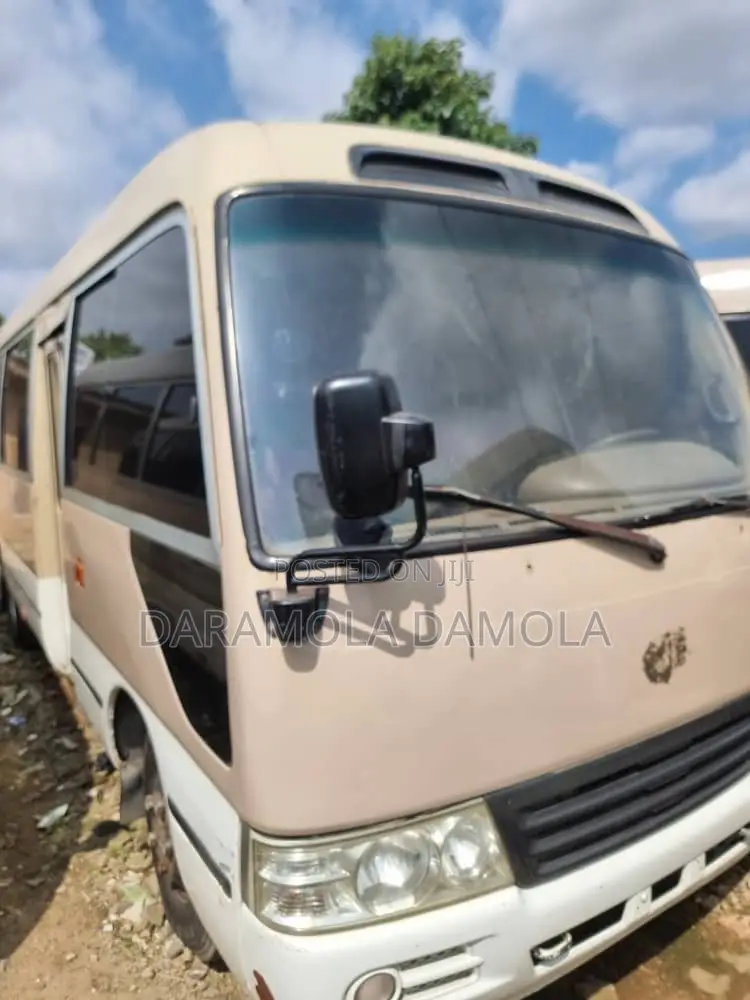 Toyota Coaster 2017 Gold