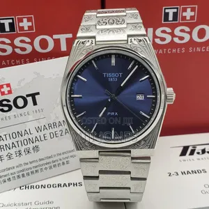 *Tissot  Men’S Battery‐Powered Silver Chain‐Strap Watch*