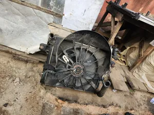Radiator and Fan and Condenser for America Commander. 206