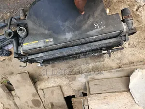 Radiator and Fan and Condenser for America Commander. 206