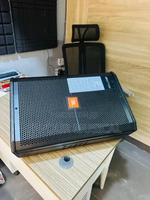 JBL Srx712m 12-Inch High-Power Two-Way Stage Monitor Speaker.