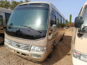 Toyota Coaster 2012 Gold