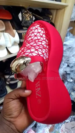 Red Heeled Ladies Shoe With Net Design