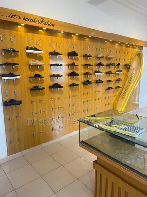 Luxury Shoe Rack Display Wall – Italian-Inspired Retail Setup