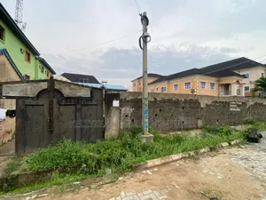 Full Plot of Land With a Demolish Able Set Back Structure
