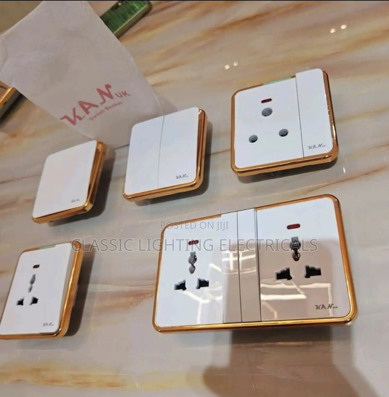 White And Gold Switch’S And Socket