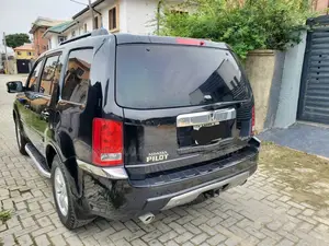 Honda Pilot Touring 4dr SUV 4WD (3.5L 6cyl 5A) 2009 Black