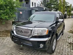Honda Pilot Touring 4dr SUV 4WD (3.5L 6cyl 5A) 2009 Black