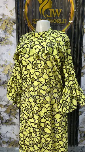 Yellow and Black Net Gown