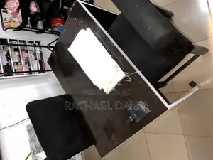 Office Table With Tires and Two Chairs