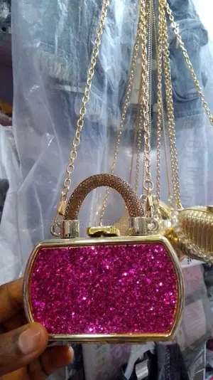 Gold Purse With Red Designs