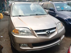Acura MDX Touring 4dr SUV AWD (3.5L 6cyl 5A) 2006 Gold
