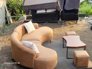 Brown Curved Couch