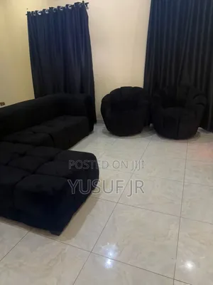Black L Shape and One Single Chair