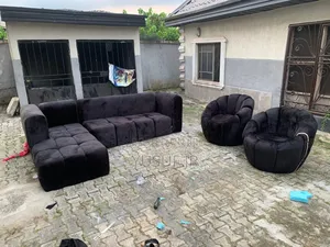 Black L Shape and One Single Chair
