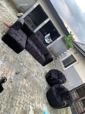 Black L Shape and One Single Chair