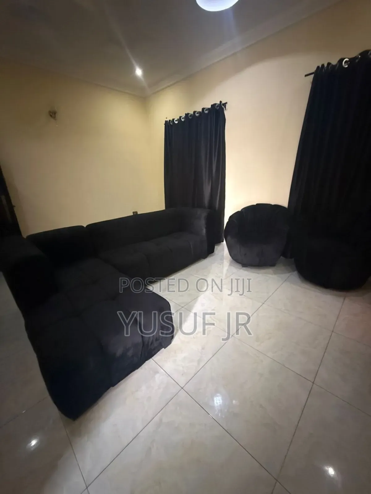Black L Shape and One Single Chair