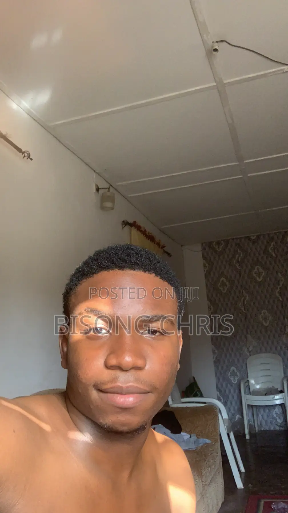 Male Store Assistant in a Drinks Shop
