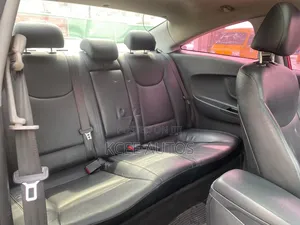 Hyundai Elantra SE Coupe FWD (1.8L 4cyl 6A) 2013 Red