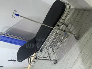 Stainless Patient Trolley With Backrest.
