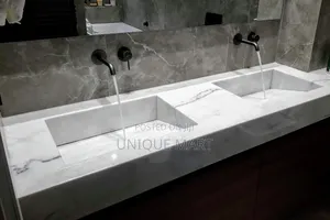 White Crafted Marble Sink Countertop.