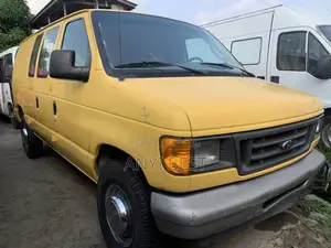 Ford E250 2004 Yellow