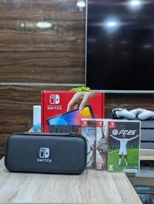Uk-Used Open-Box Nintendo Switch Oled — Fc25 + Two Disc Games.