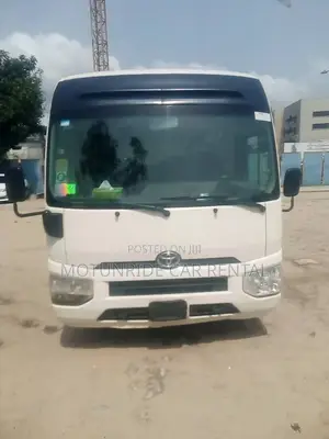 New Model Toyota Coaster Bus for Daily Rental in Lagos Outside Lagos