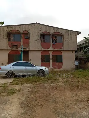 An Acre of Land With a 4 Flat Building With a Bq for Sale